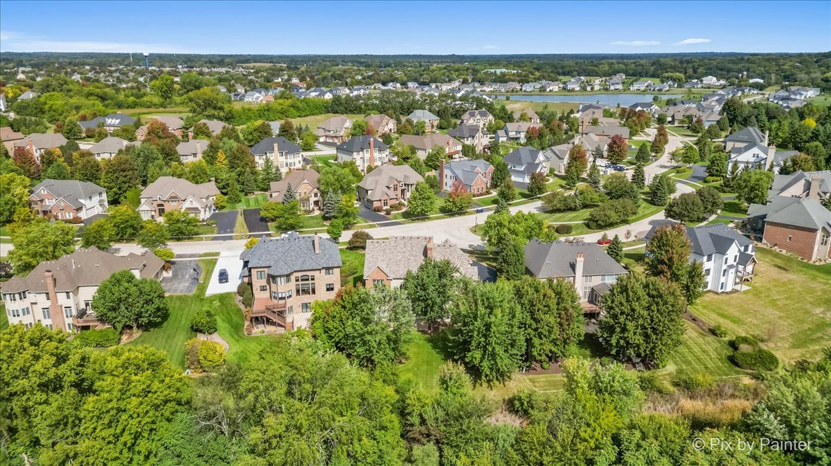 39W599 Walt Whitman Road St. Charles, IL 60175 - Photo 67 of 74 an aerial view of a house with a yard