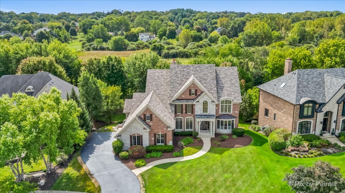 39W599 Walt Whitman Road St. Charles, IL 60175 - Photo 74 of 74 an aerial view of a house with yard and green space