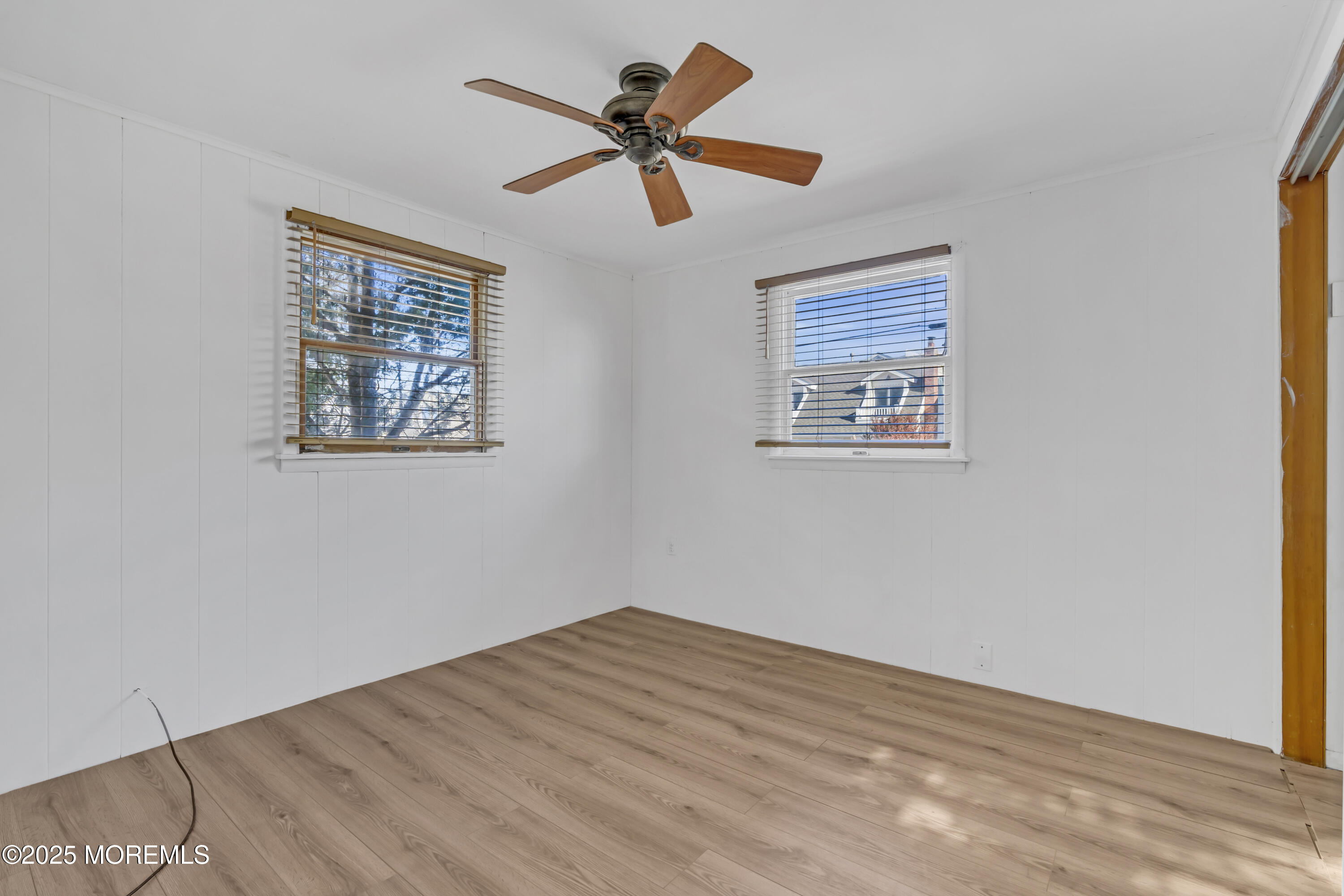 113 East Mermaid Lane Beach Haven, NJ 08008 - Photo 18 of 34 a view of empty room with wooden floor