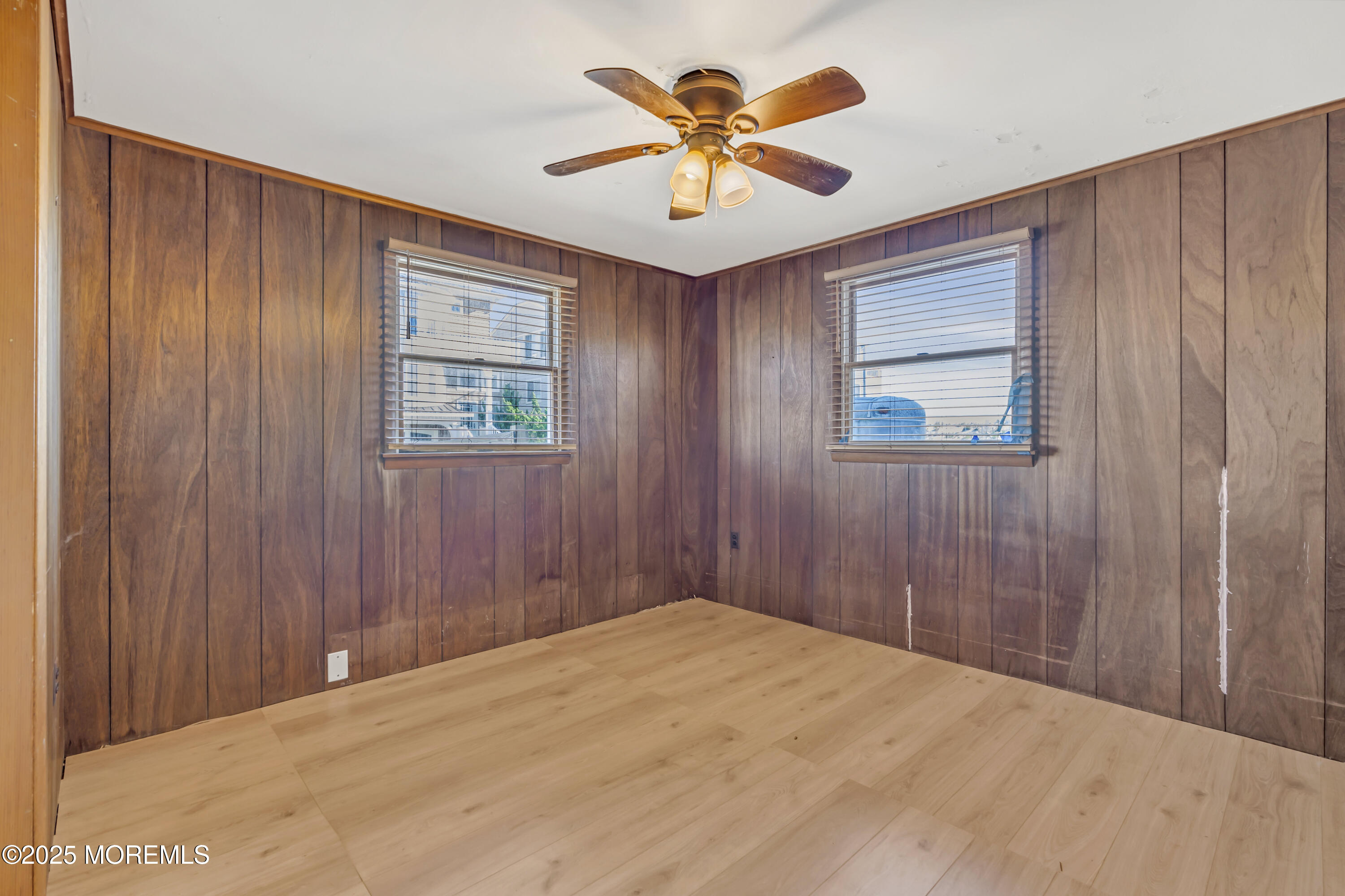 113 East Mermaid Lane Beach Haven, NJ 08008 - Photo 19 of 34 a view of empty room with a ceiling fan and a window