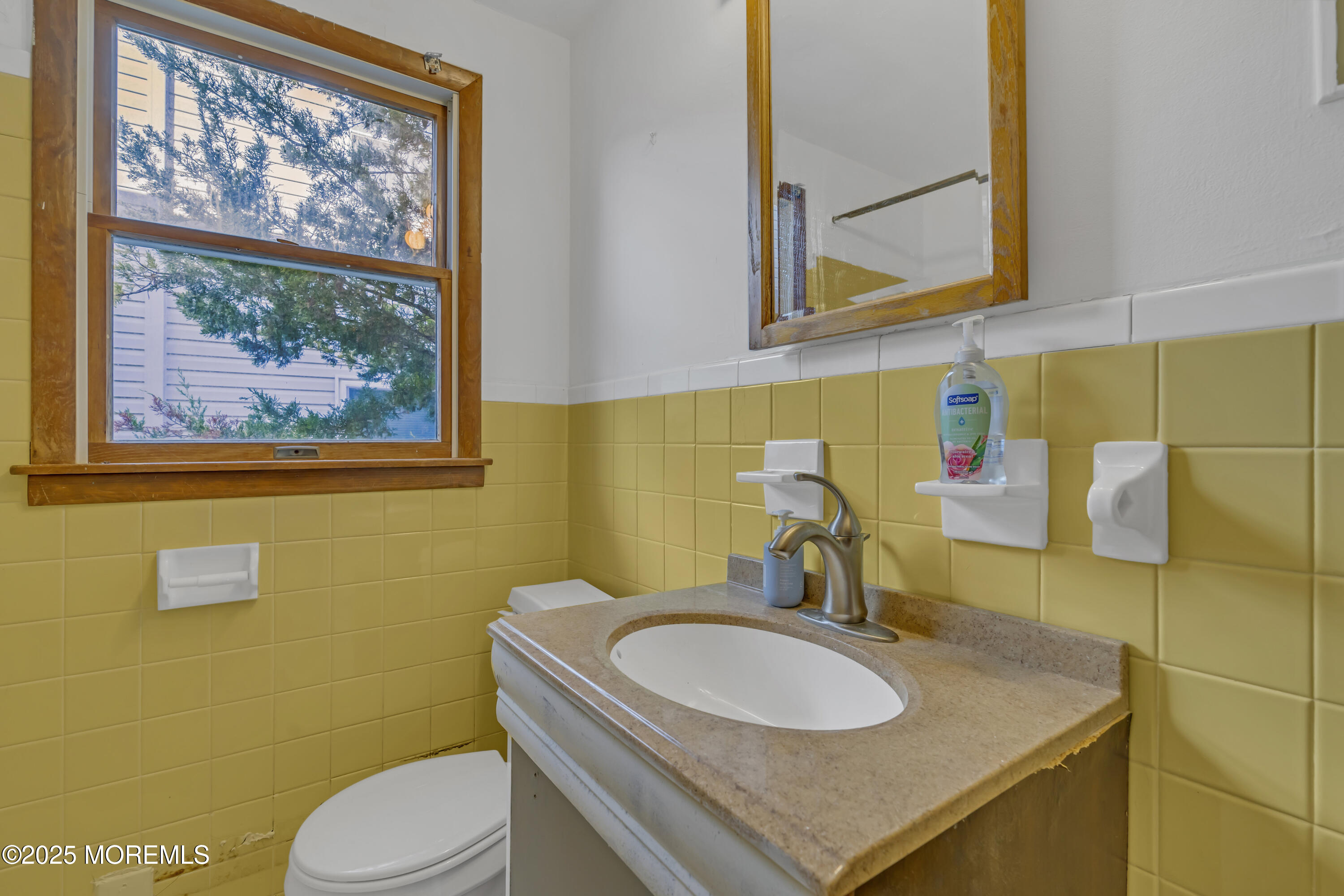 113 East Mermaid Lane Beach Haven, NJ 08008 - Photo 21 of 34 a bathroom with a sink and a toilet