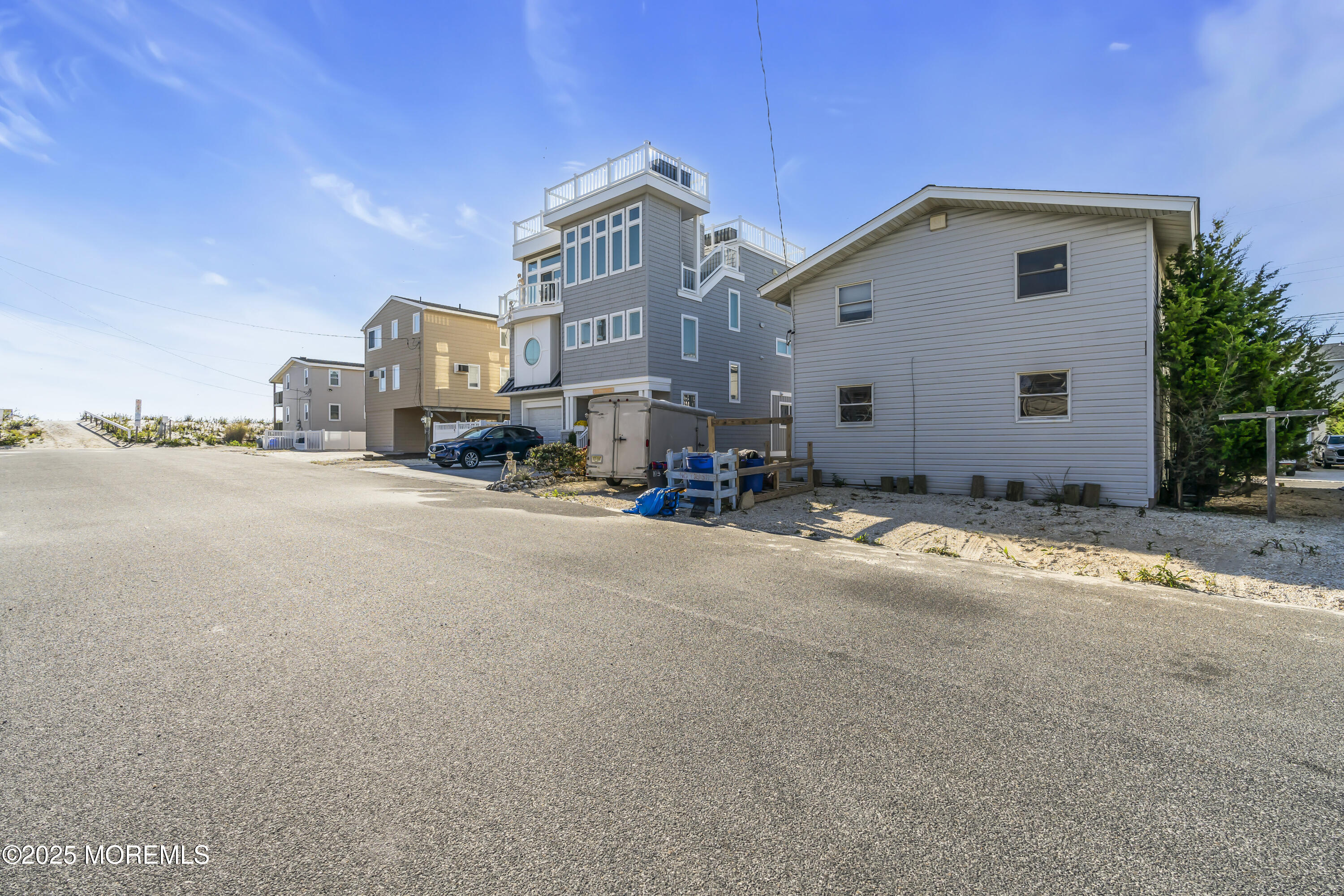 113 East Mermaid Lane Beach Haven, NJ 08008 - Photo 8 of 34 a front view of a house with a yard