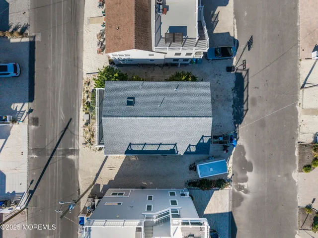 an aerial view of beach and ocean