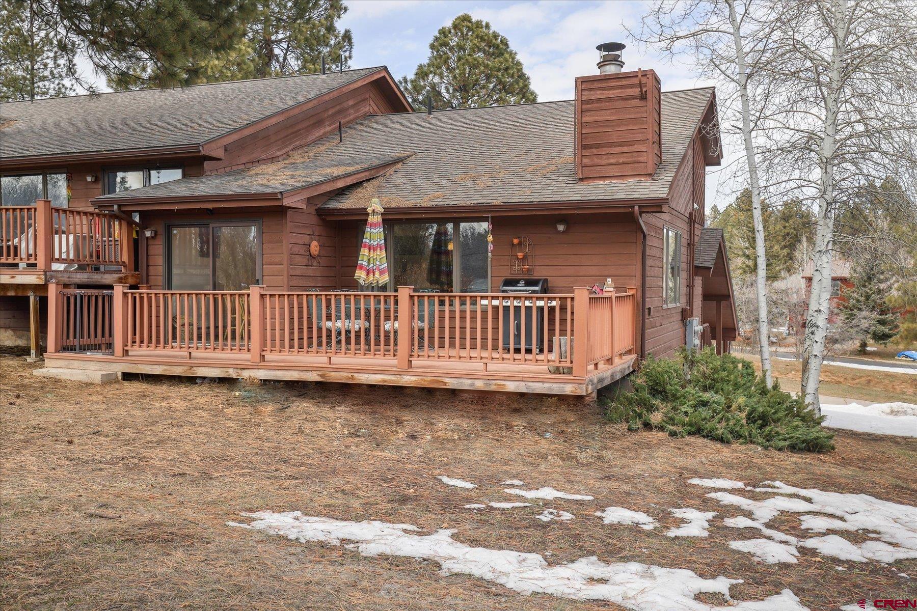 202 Pine Ridge Loop Durango, CO 81301 - Photo 13 of 33 a front view of a house with garden