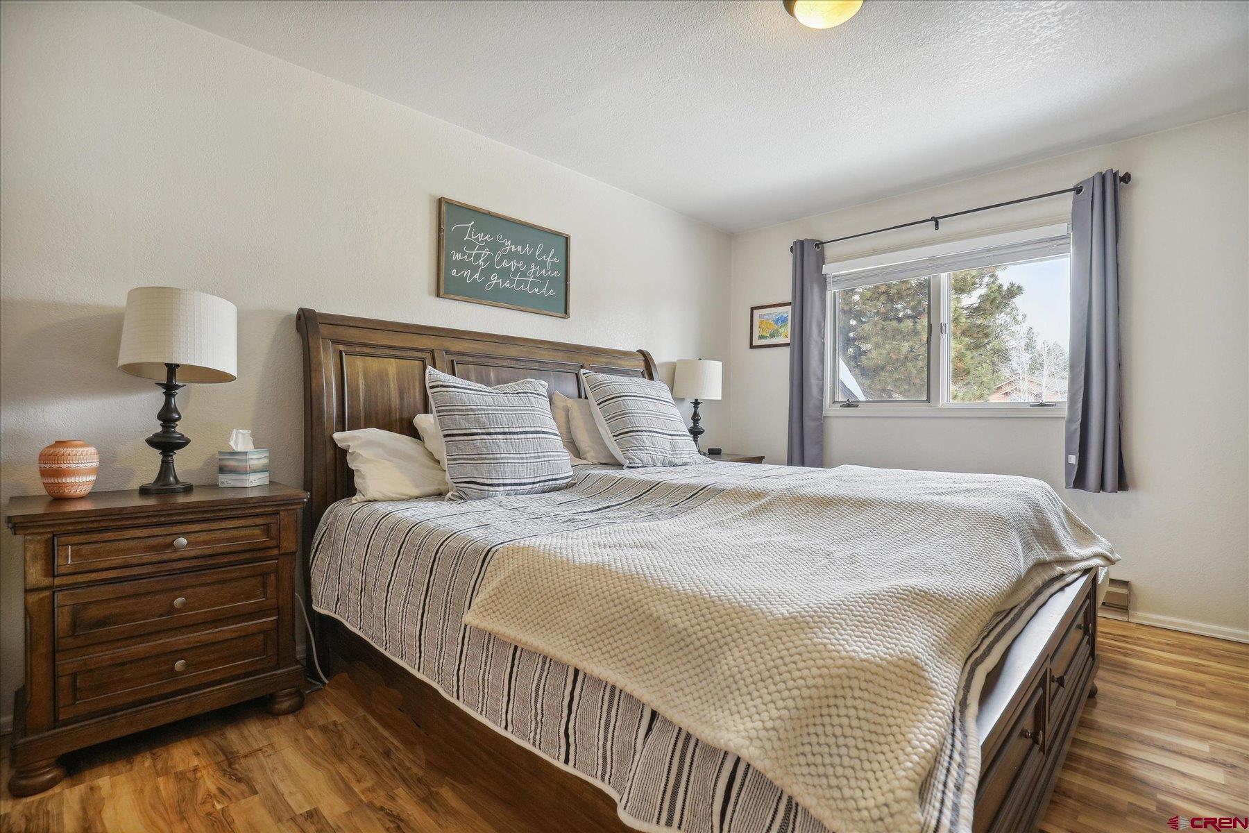 202 Pine Ridge Loop Durango, CO 81301 - Photo 16 of 33 a bedroom with a bed and a window