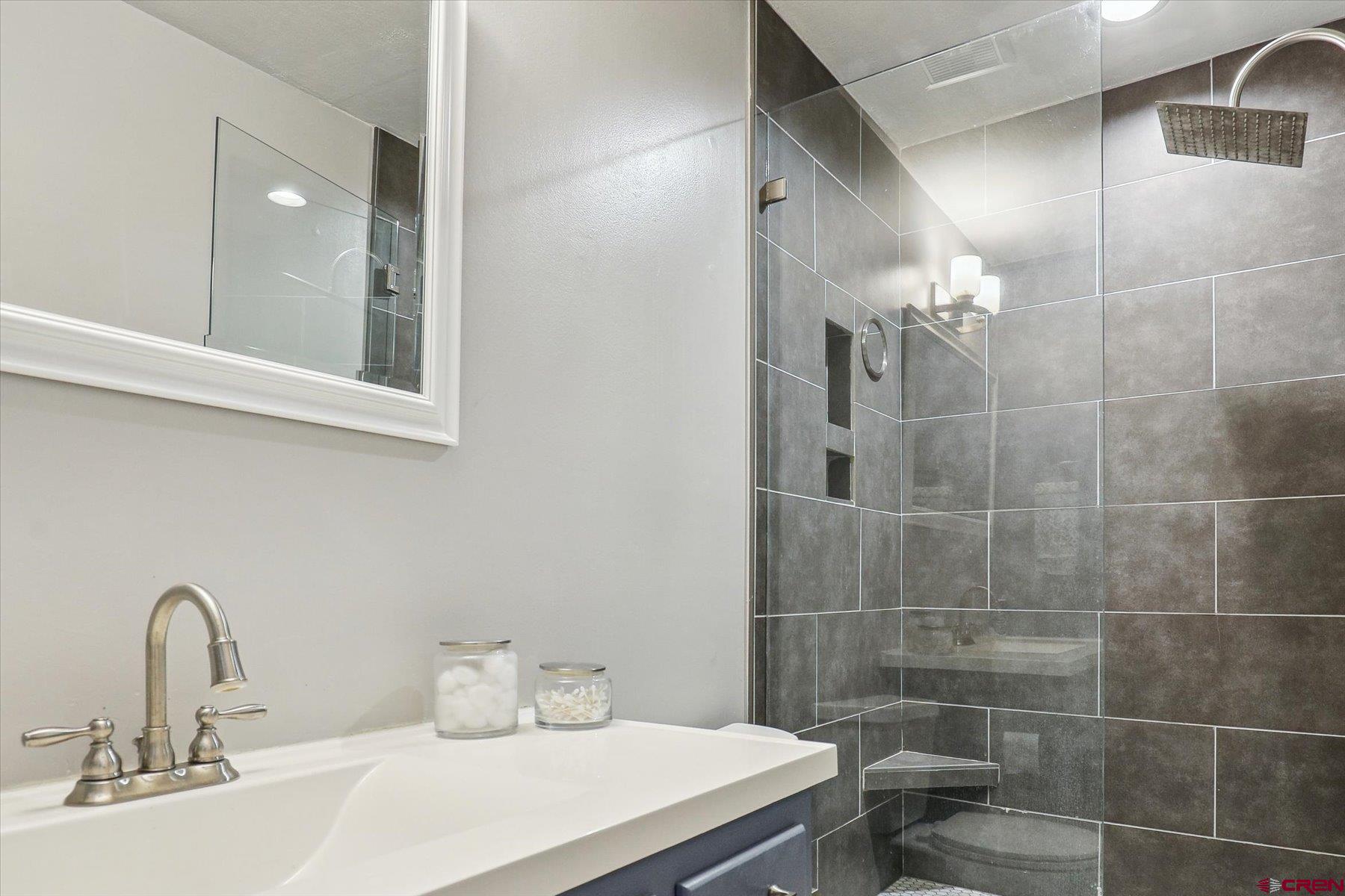 202 Pine Ridge Loop Durango, CO 81301 - Photo 18 of 33 a bathroom with a sink and a mirror