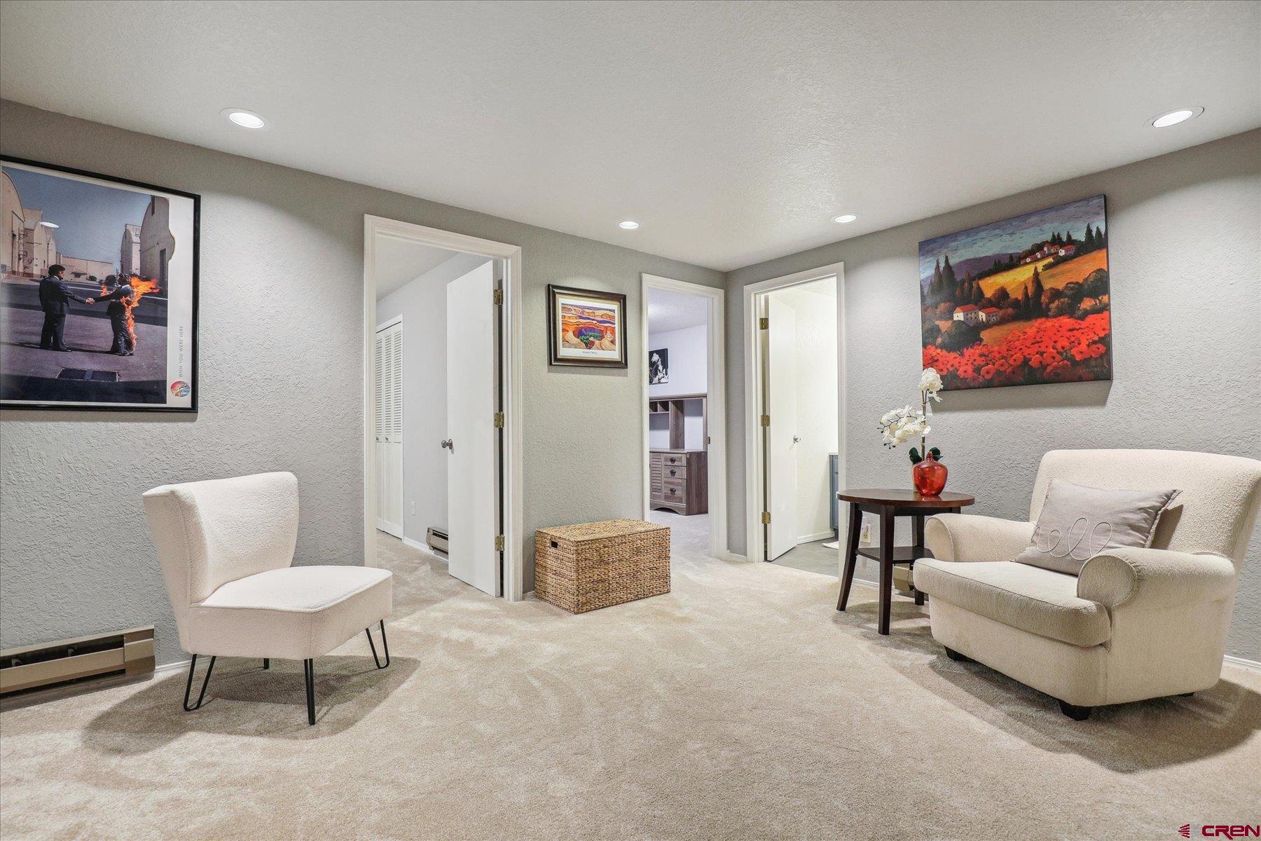 202 Pine Ridge Loop Durango, CO 81301 - Photo 20 of 33 a living room with furniture and a flat screen tv