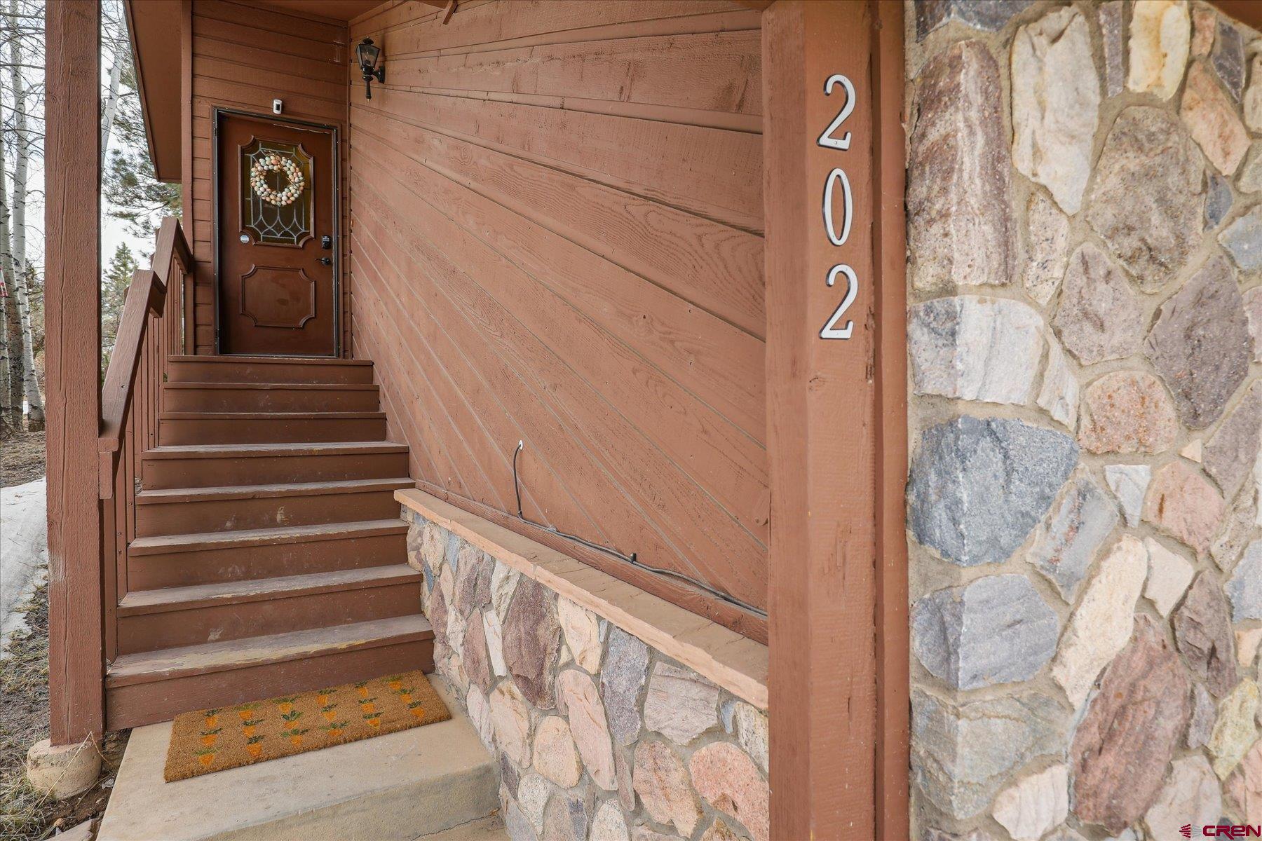 202 Pine Ridge Loop Durango, CO 81301 - Photo 2 of 33 a view of entryway with stairs