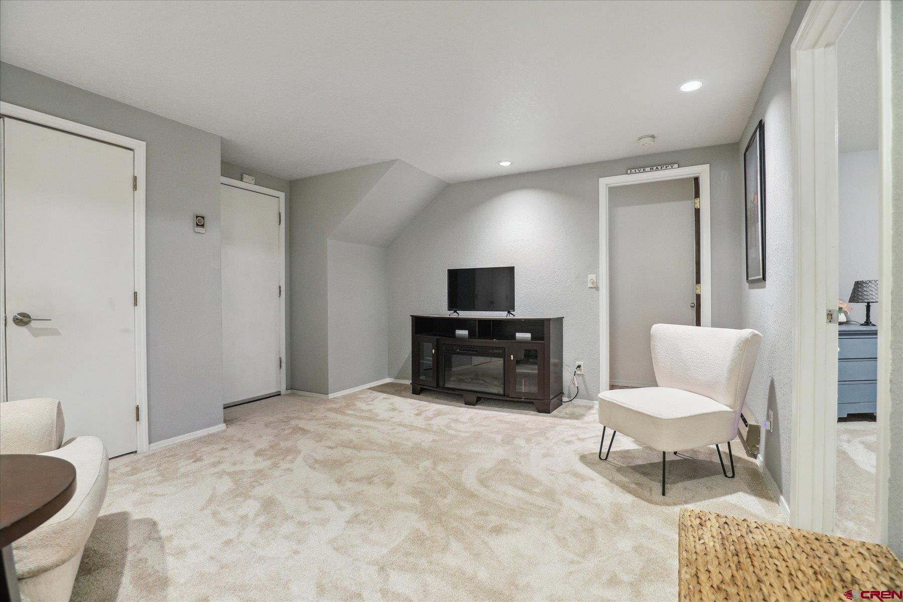 202 Pine Ridge Loop Durango, CO 81301 - Photo 21 of 33 a living room with furniture and a couch