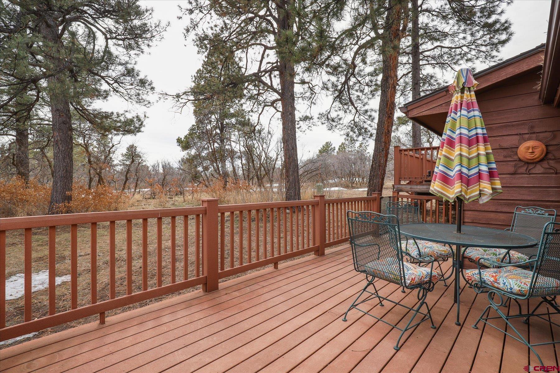 202 Pine Ridge Loop Durango, CO 81301 - Photo 33 of 33 a view of a chairs on wooden deck