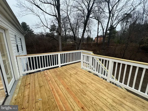 a view of a house with wooden roof
