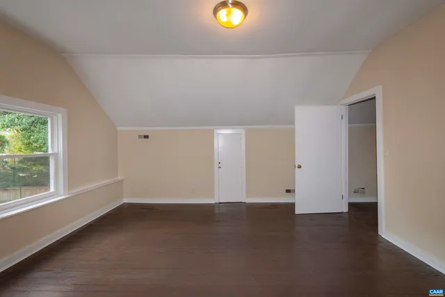 a kitchen with a refrigerator and a stove