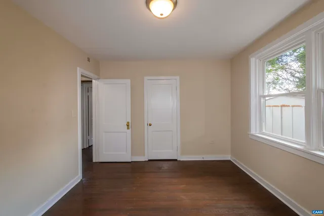 a kitchen with a refrigerator and a sink