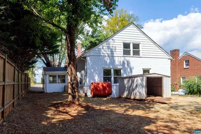 a house with trees in front of it