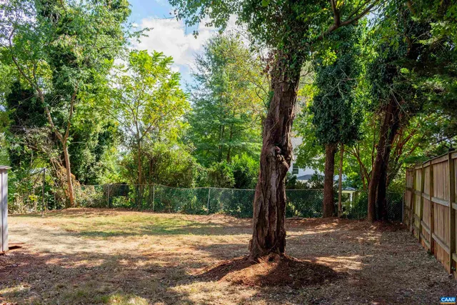 a kitchen with a stove and a refrigerator