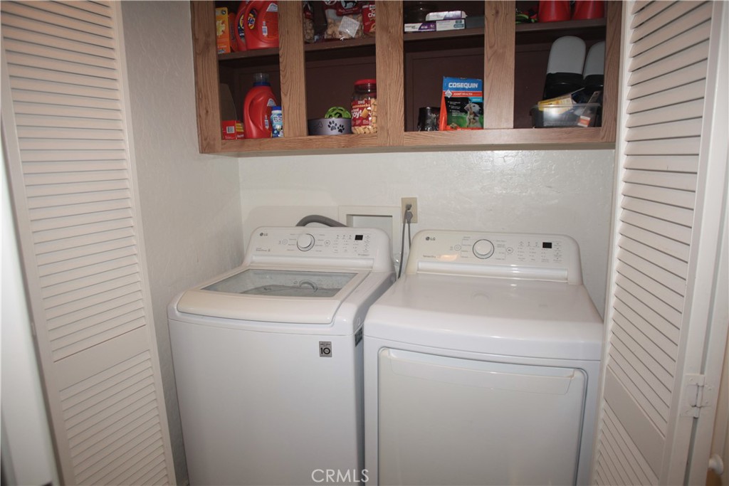 27502 Amethyst Way Castaic, CA 91384 - Photo 19 of 23 a utility room with dryer and washer