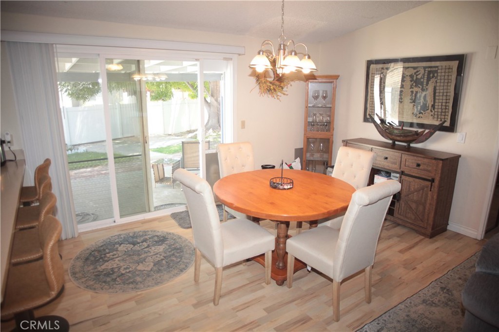 27502 Amethyst Way Castaic, CA 91384 - Photo 4 of 23 a view of a dining room with furniture window and outside view
