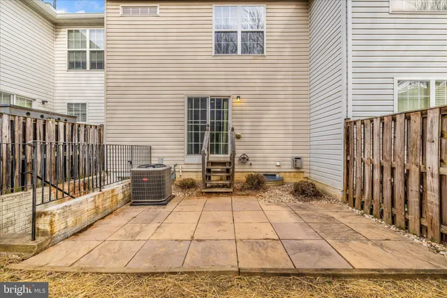a view of a terrace with sitting area