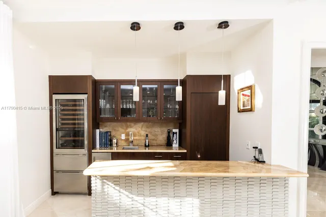 a view of living room with furniture and large window