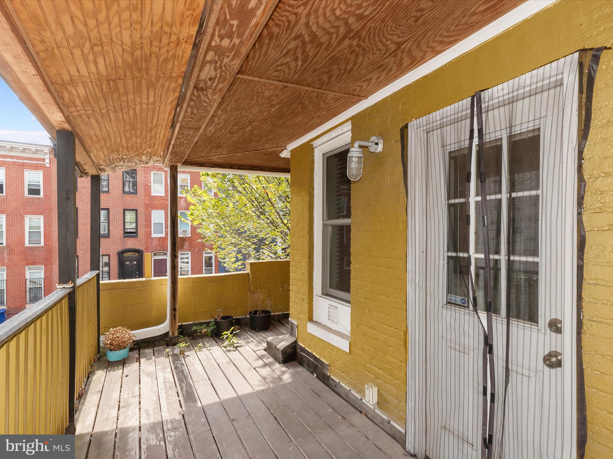 55 South Fulton Avenue Baltimore, MD 21223 - Photo 12 of 55 a view of a house with a large window
