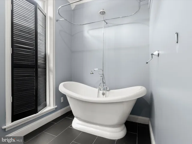 a view of a house with a large window