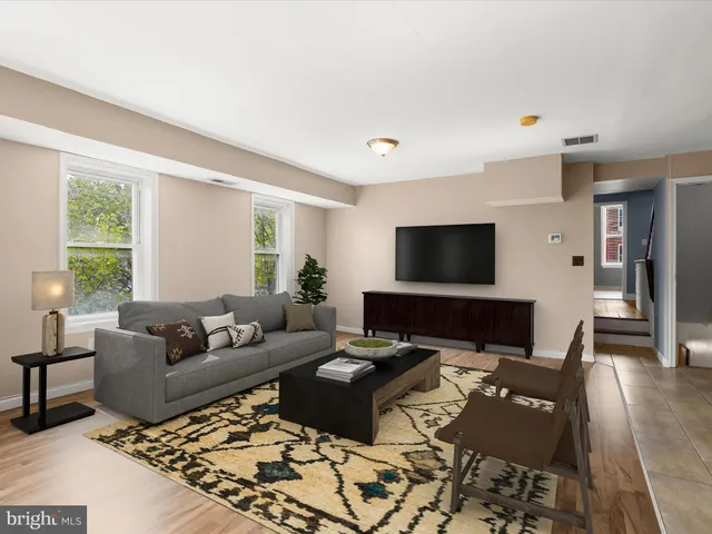 a bathroom with a sink toilet and a mirror