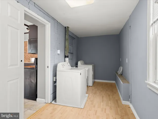 a white bath tub sitting in a bathroom