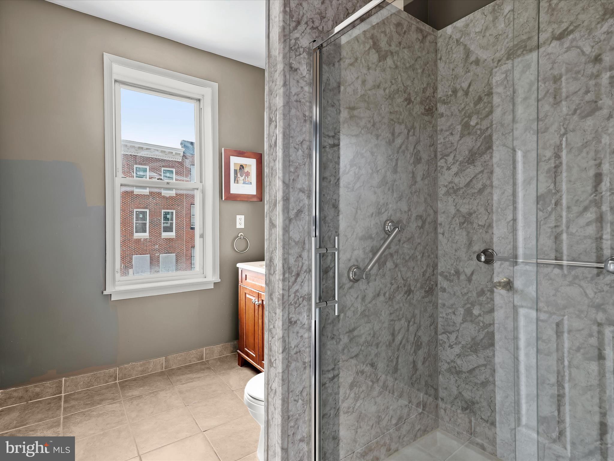 55 South Fulton Avenue Baltimore, MD 21223 - Photo 31 of 55 a view of an empty room with window