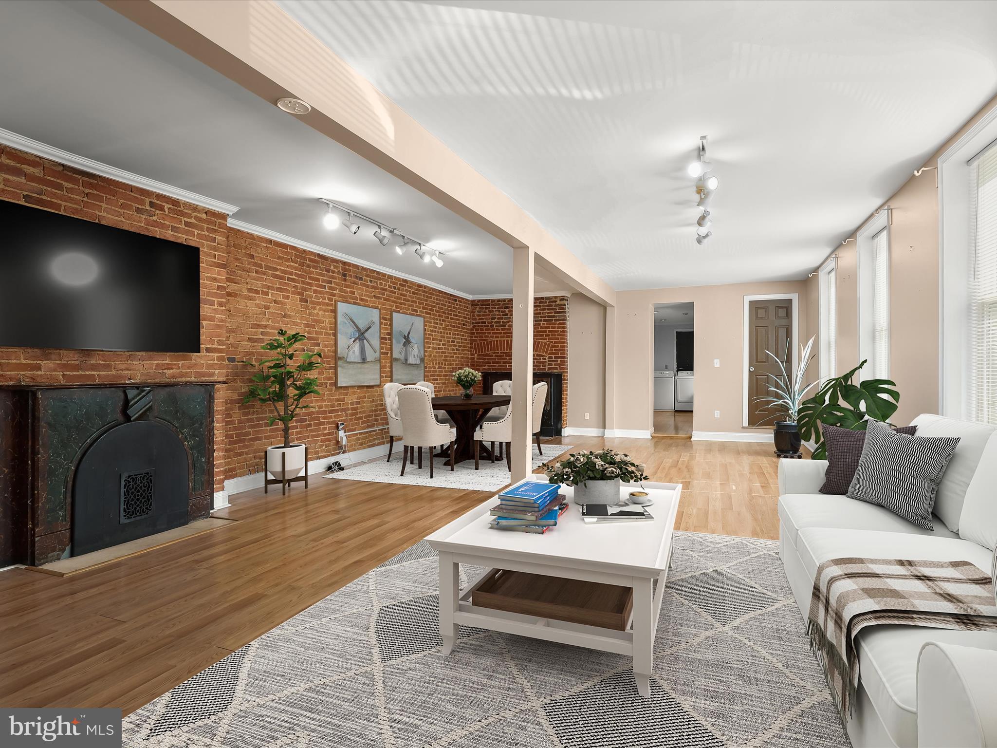 55 South Fulton Avenue Baltimore, MD 21223 - Photo 44 of 55 a living room with fireplace furniture and a flat screen tv