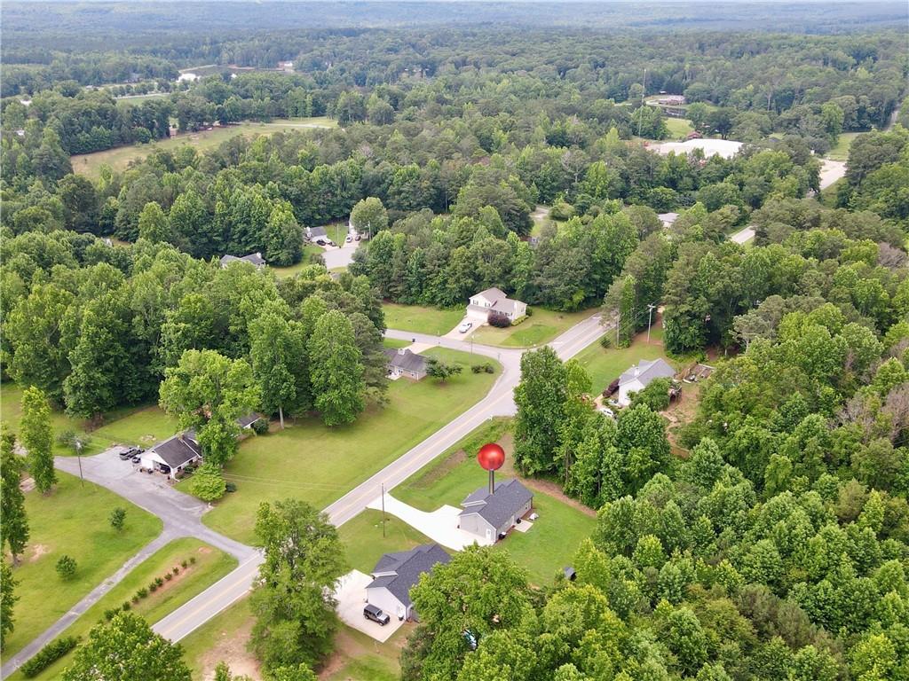 1776 Pleasant Grove Road Temple, GA 30179 - Photo 44 of 45 an aerial view of residential houses with outdoor space and trees