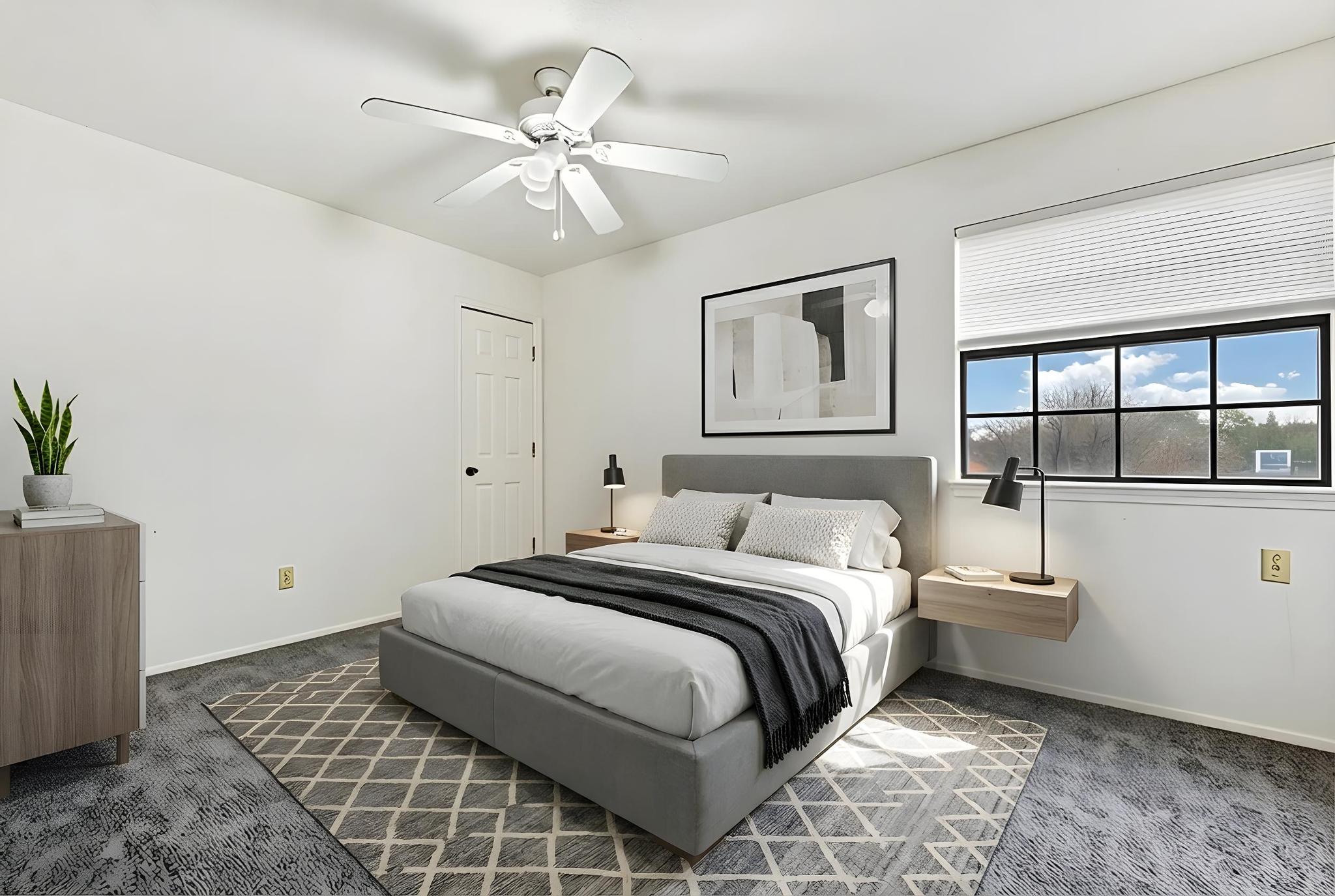 11918 Snow Finch Road Austin, TX 78758 - Photo 18 of 33 Bedroom featuring dark carpet and a ceiling fan