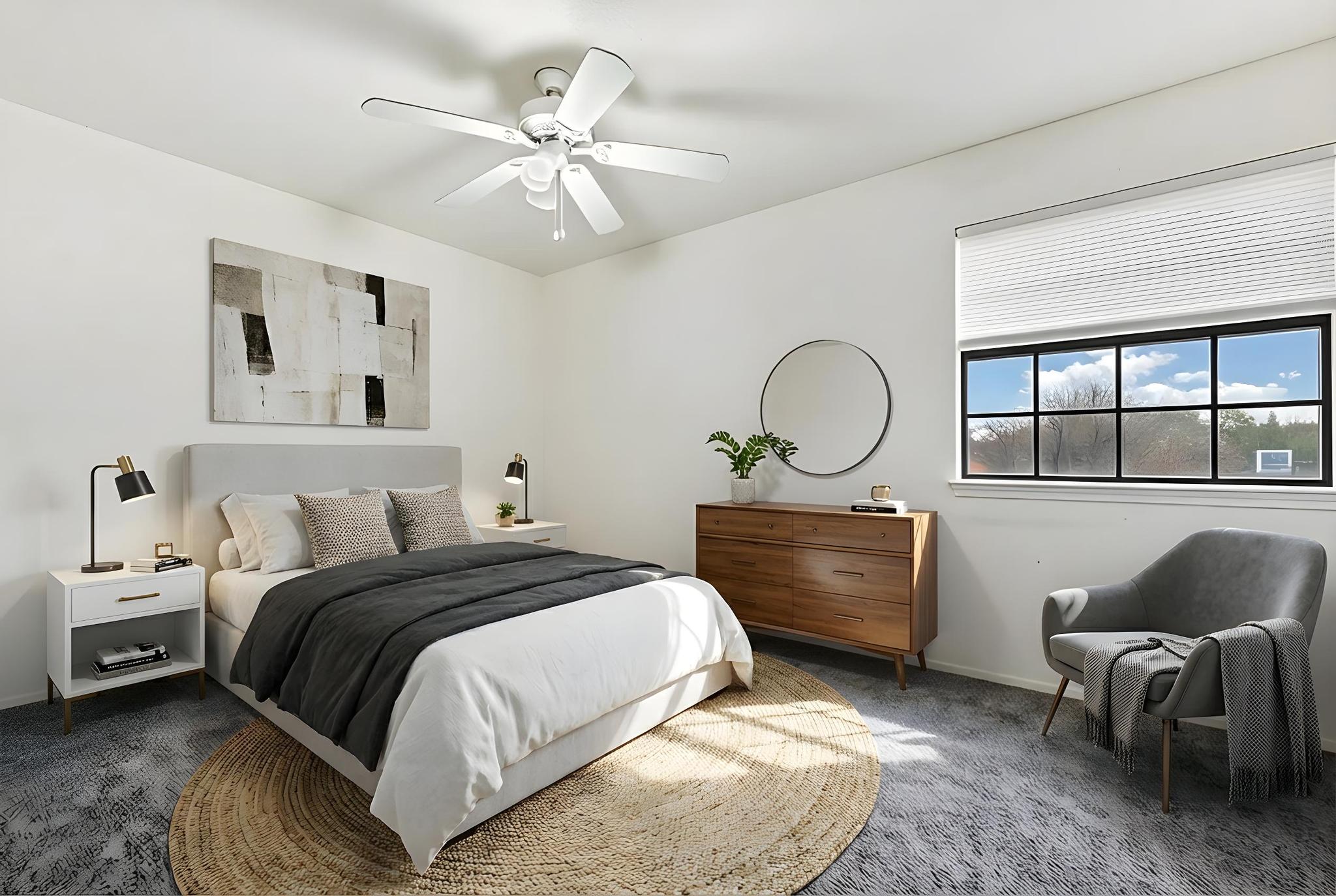 11918 Snow Finch Road Austin, TX 78758 - Photo 20 of 33 Bedroom with carpet and a ceiling fan