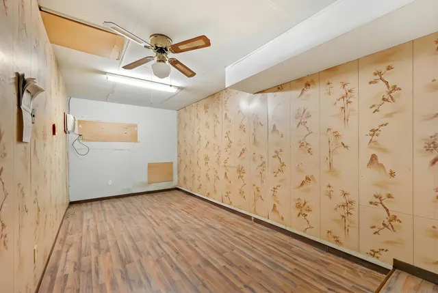 a view of entryway with wooden floor