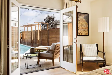 a view of balcony with furniture