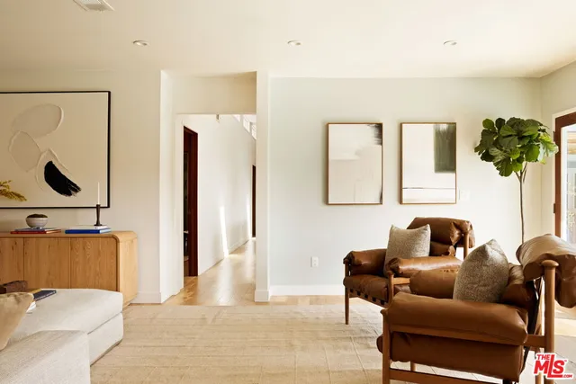 a bedroom with furniture and a couch