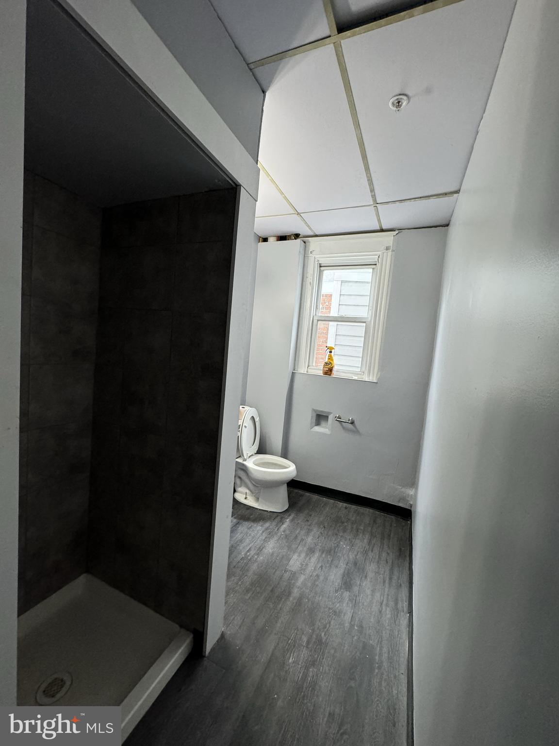 15 Church Lane, Unit 2B Lansdowne, PA 19050 - Photo 4 of 7 a bathroom with a toilet and a shower