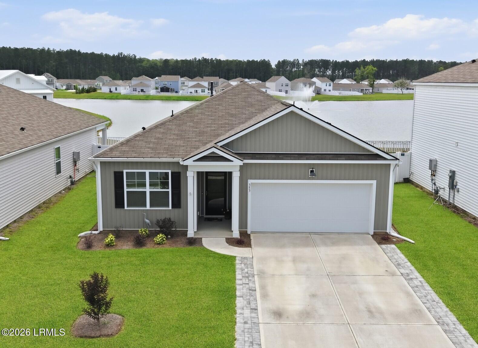 353 Sanctuary Drive Ridgeland, SC 29936 - Photo 1 of 47 Front View w Lagoon