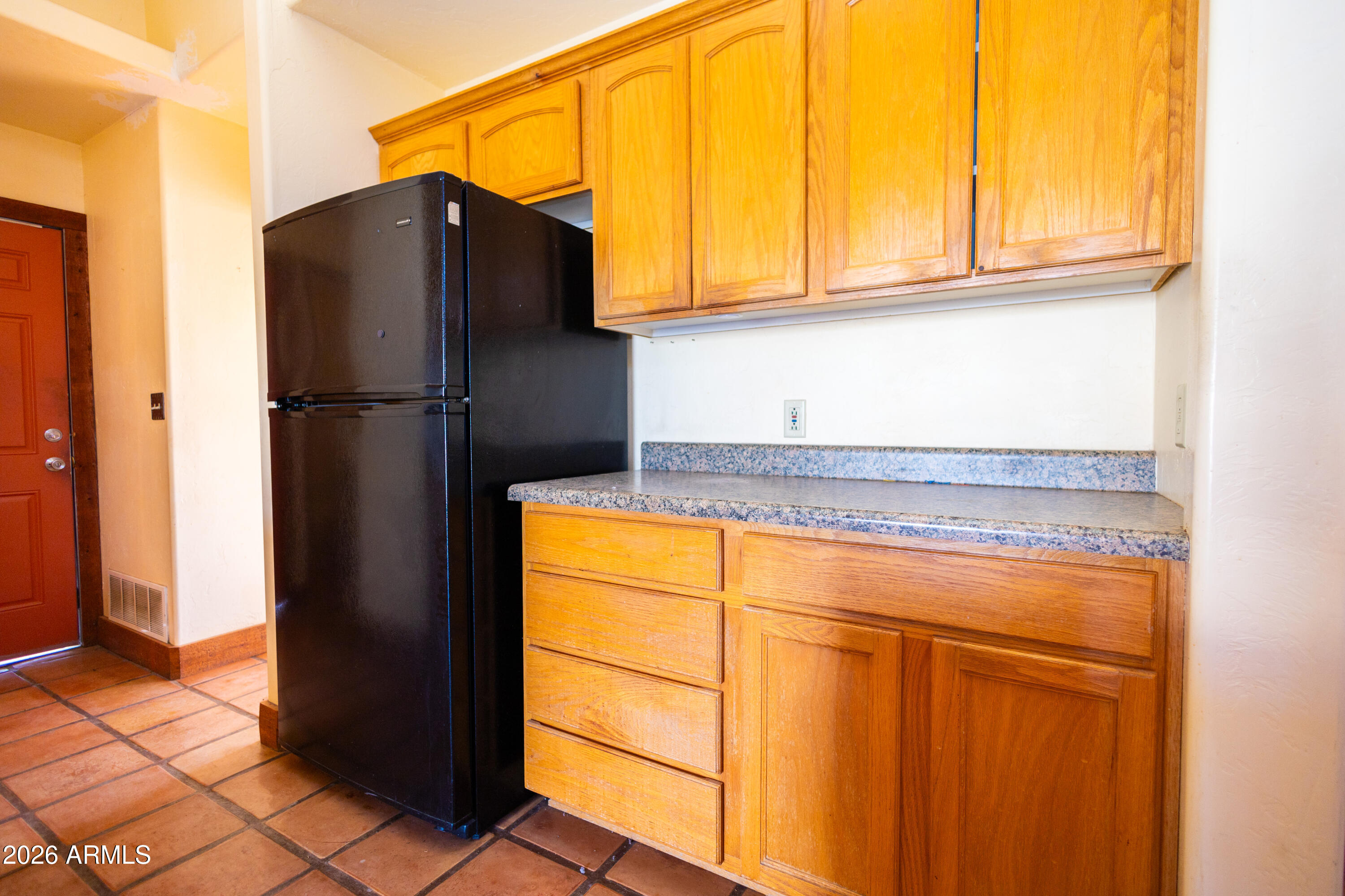 4105 North Washington Avenue Douglas, AZ 85607 - Photo 58 of 61 a kitchen with stainless steel appliances granite countertop a refrigerator and a stove