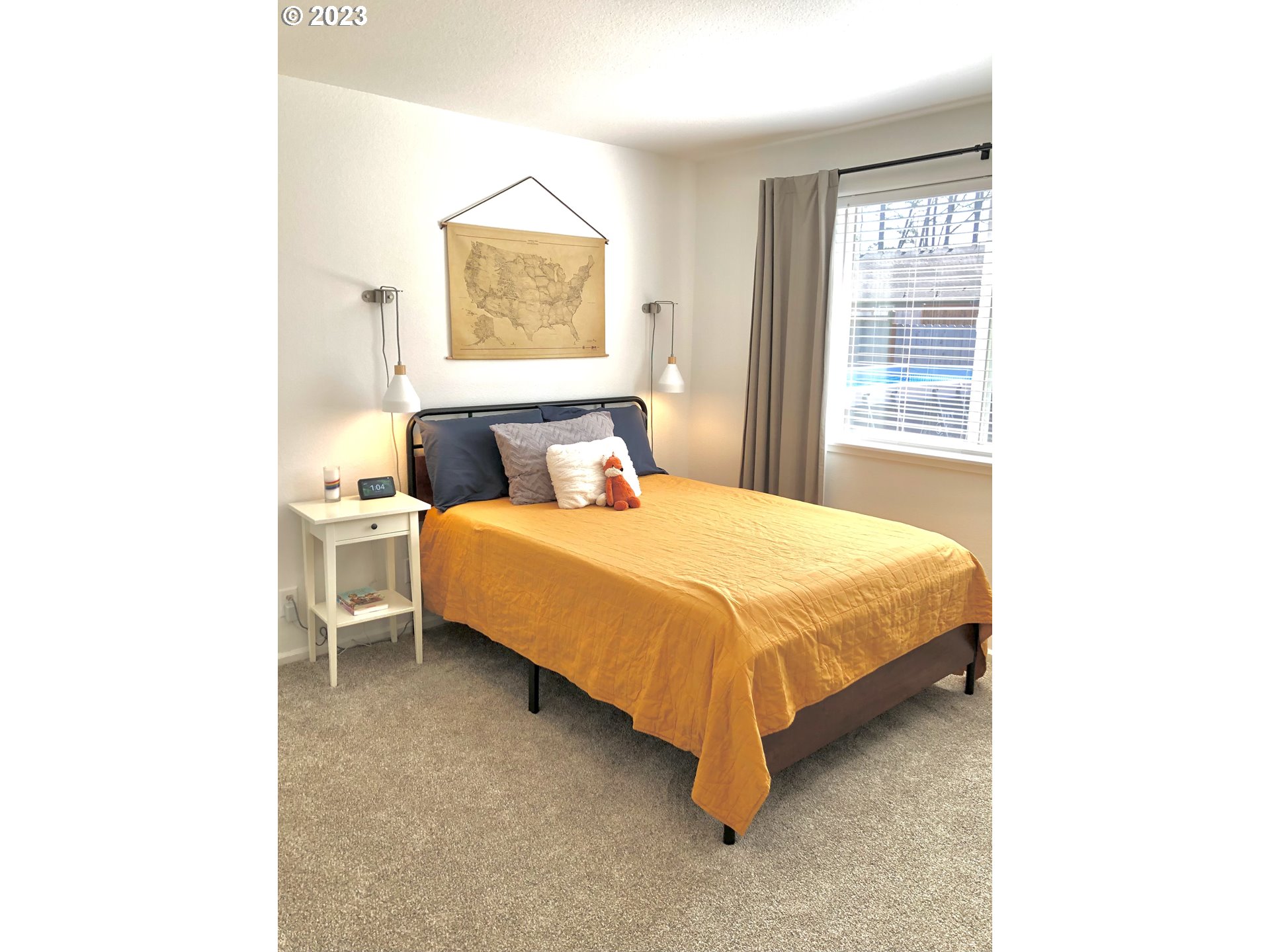4961 Forsythia Street Springfield, OR 97478 - Photo 12 of 14 a bedroom with a bed and a window