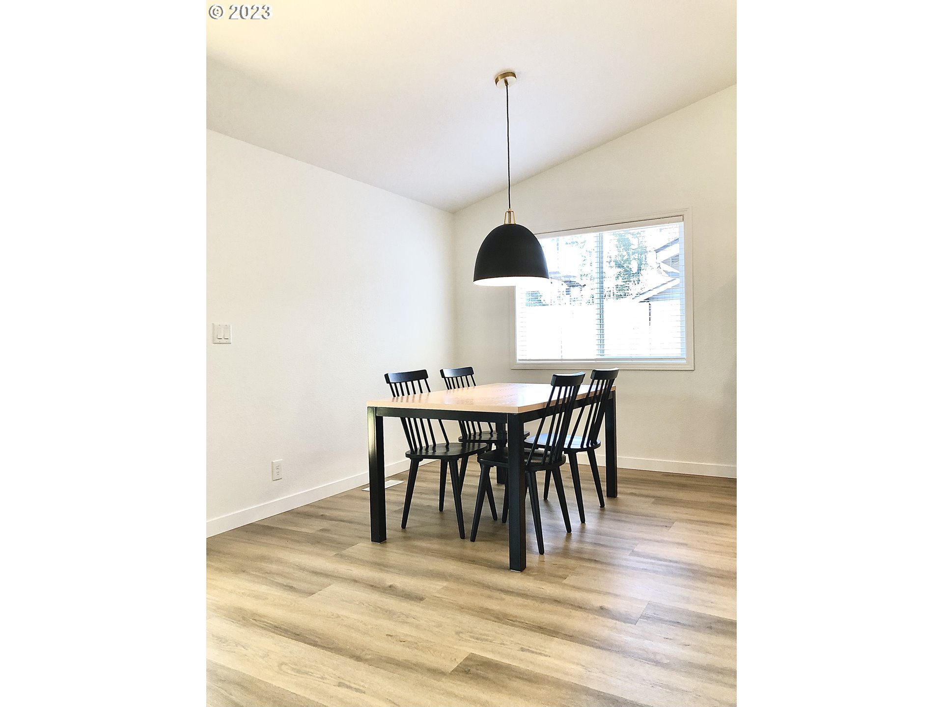 4961 Forsythia Street Springfield, OR 97478 - Photo 4 of 14 a view of a dining room with a table and chairs