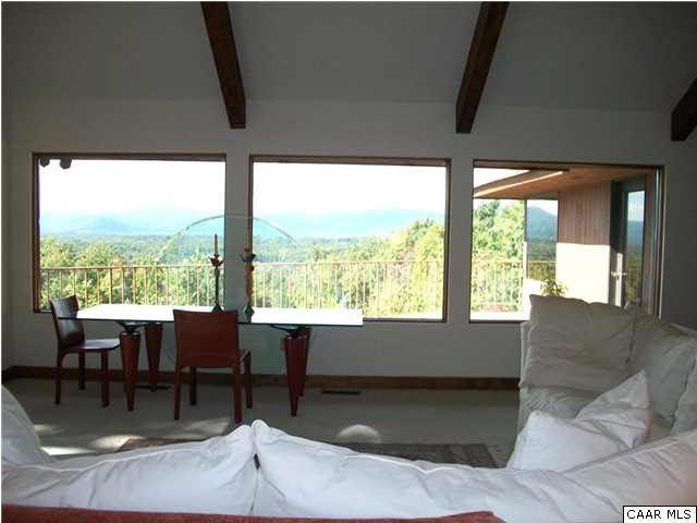 5462 Laurel Ridge Road Charlottesville, VA 22911 - Photo 29 of 50 a living room with furniture and a large window