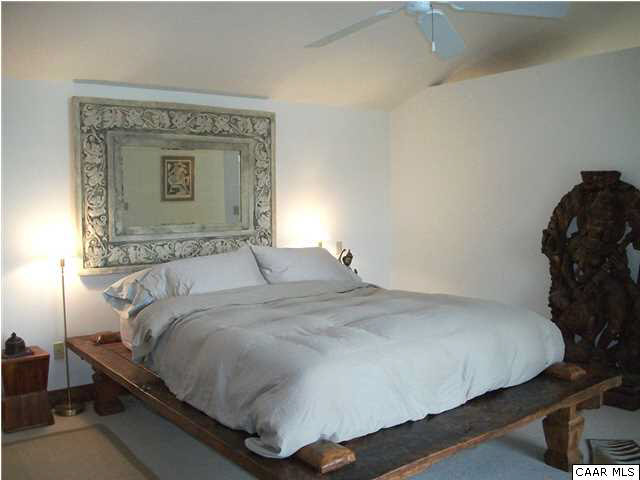5462 Laurel Ridge Road Charlottesville, VA 22911 - Photo 30 of 50 a bedroom with a bed and a dresser in it