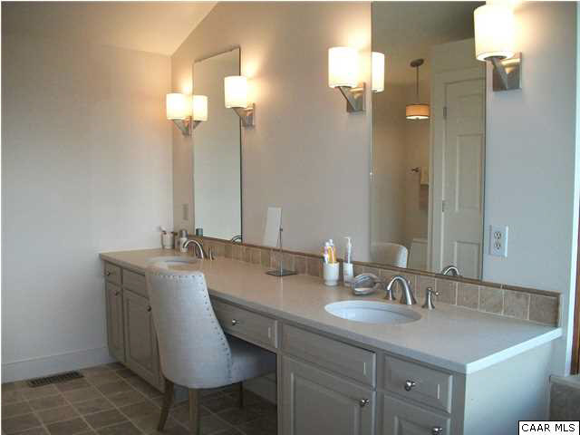 5462 Laurel Ridge Road Charlottesville, VA 22911 - Photo 33 of 50 a bathroom with a sink and a mirror