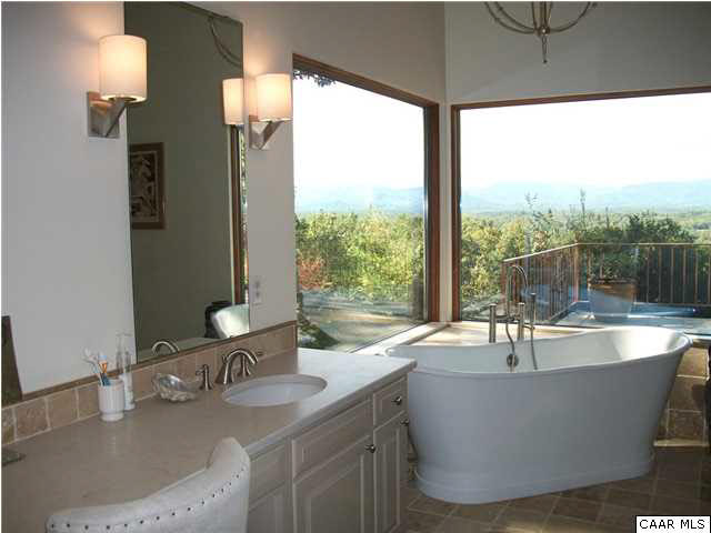 5462 Laurel Ridge Road Charlottesville, VA 22911 - Photo 34 of 50 a room with a table and chairs
