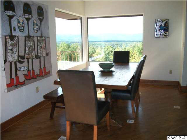 5462 Laurel Ridge Road Charlottesville, VA 22911 - Photo 43 of 50 a dining room with furniture and a window