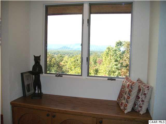 5462 Laurel Ridge Road Charlottesville, VA 22911 - Photo 45 of 50 a view of a windows and chair in a room