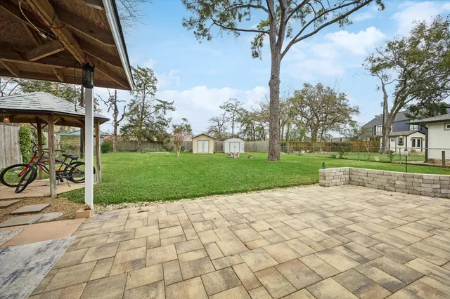 a view of a backyard with a garden