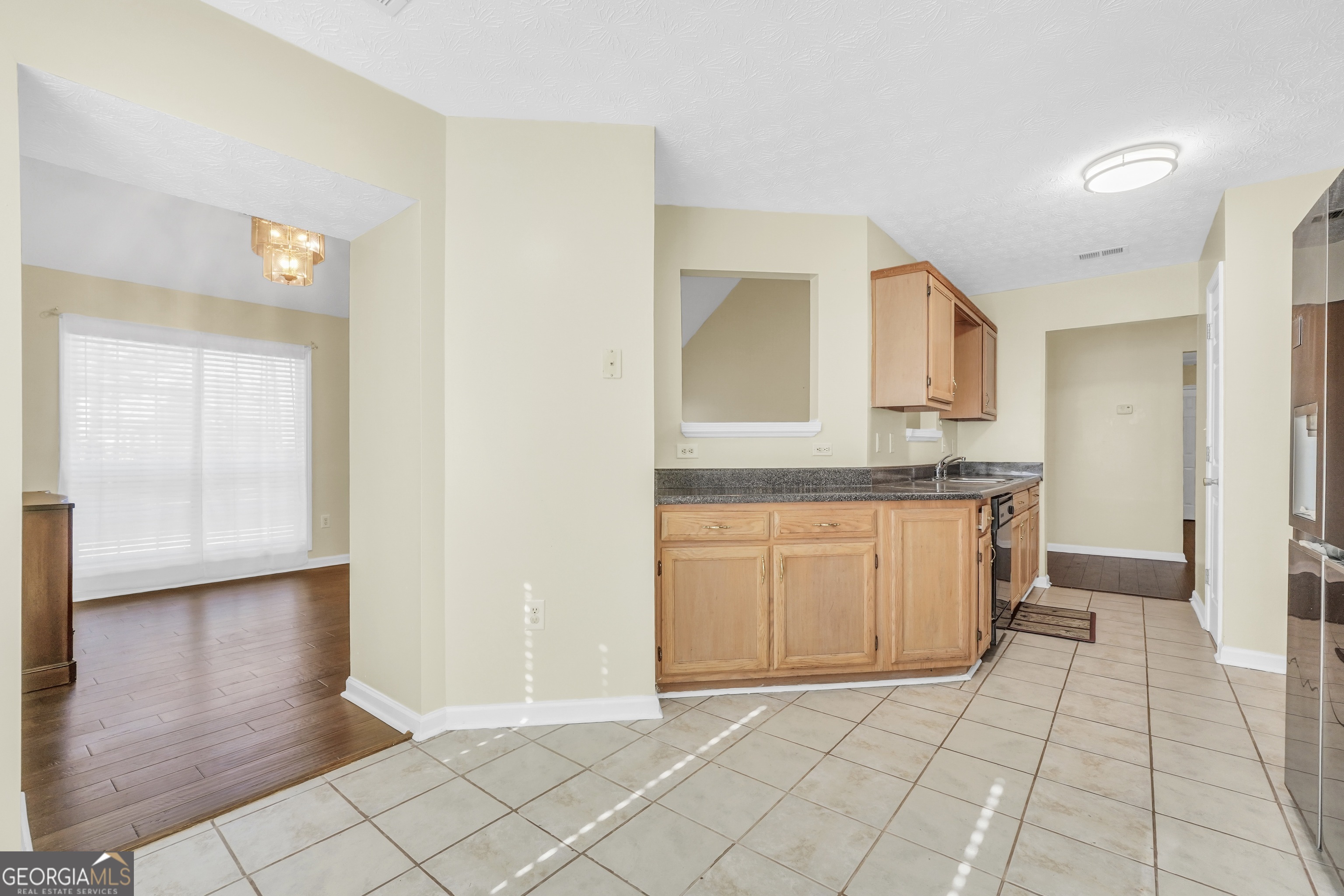 9247 Ryan Ridge Court Jonesboro, GA 30238 - Photo 16 of 36 Kitchen lading to formal dining room