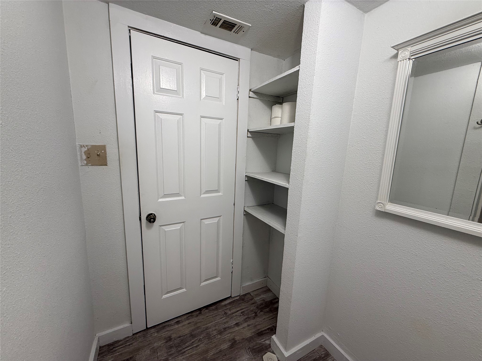 909 East Market Street Lockhart, TX 78644 - Photo 12 of 19 a view of storage and utility room
