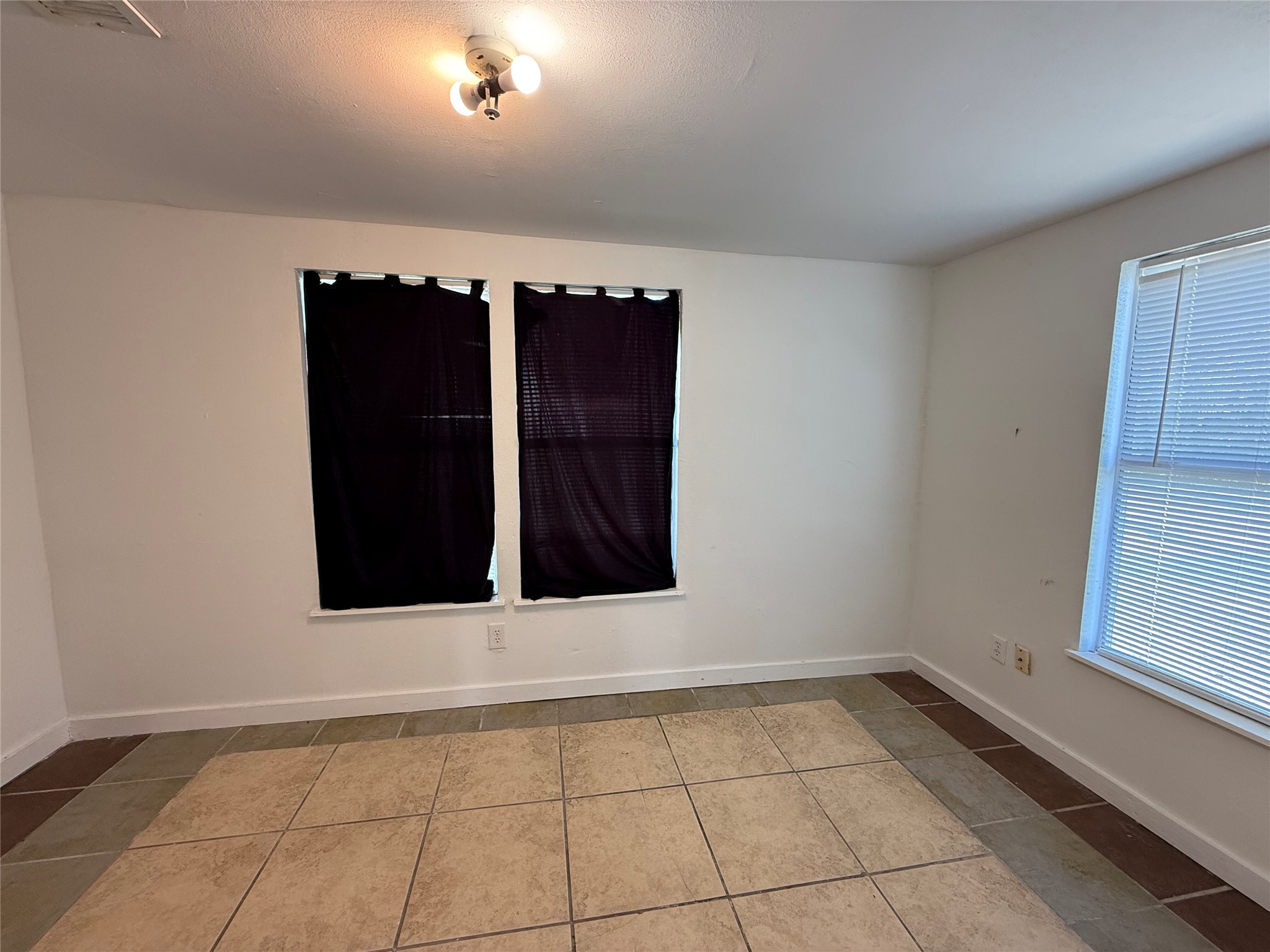 909 East Market Street Lockhart, TX 78644 - Photo 9 of 19 a view of an empty room